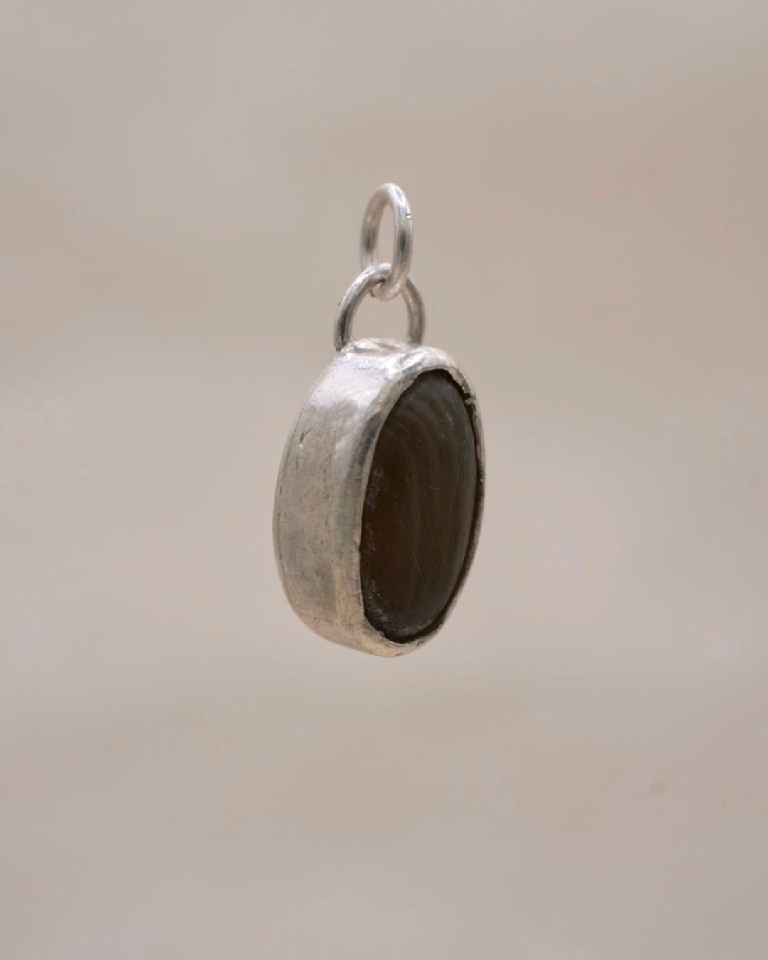 SYNTHETIC HORN CHARM
